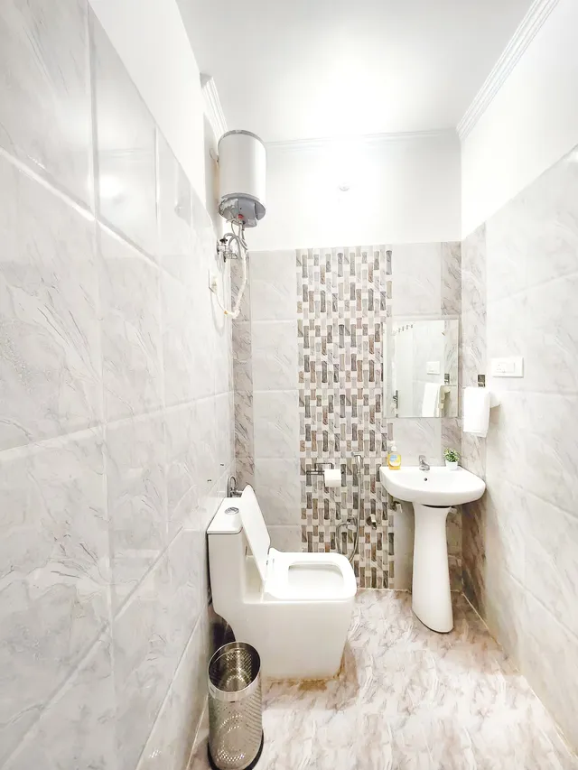 Timber Luxe Ateliér — washroom with premium fittings