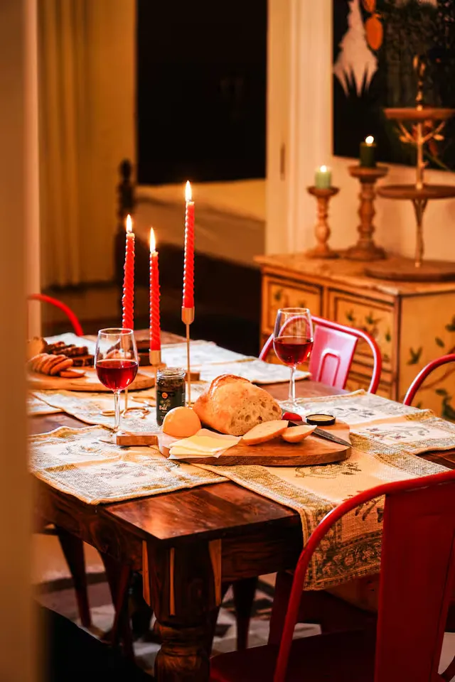 Timber Luxe Ateliér — candlelit dining table set for shared meals